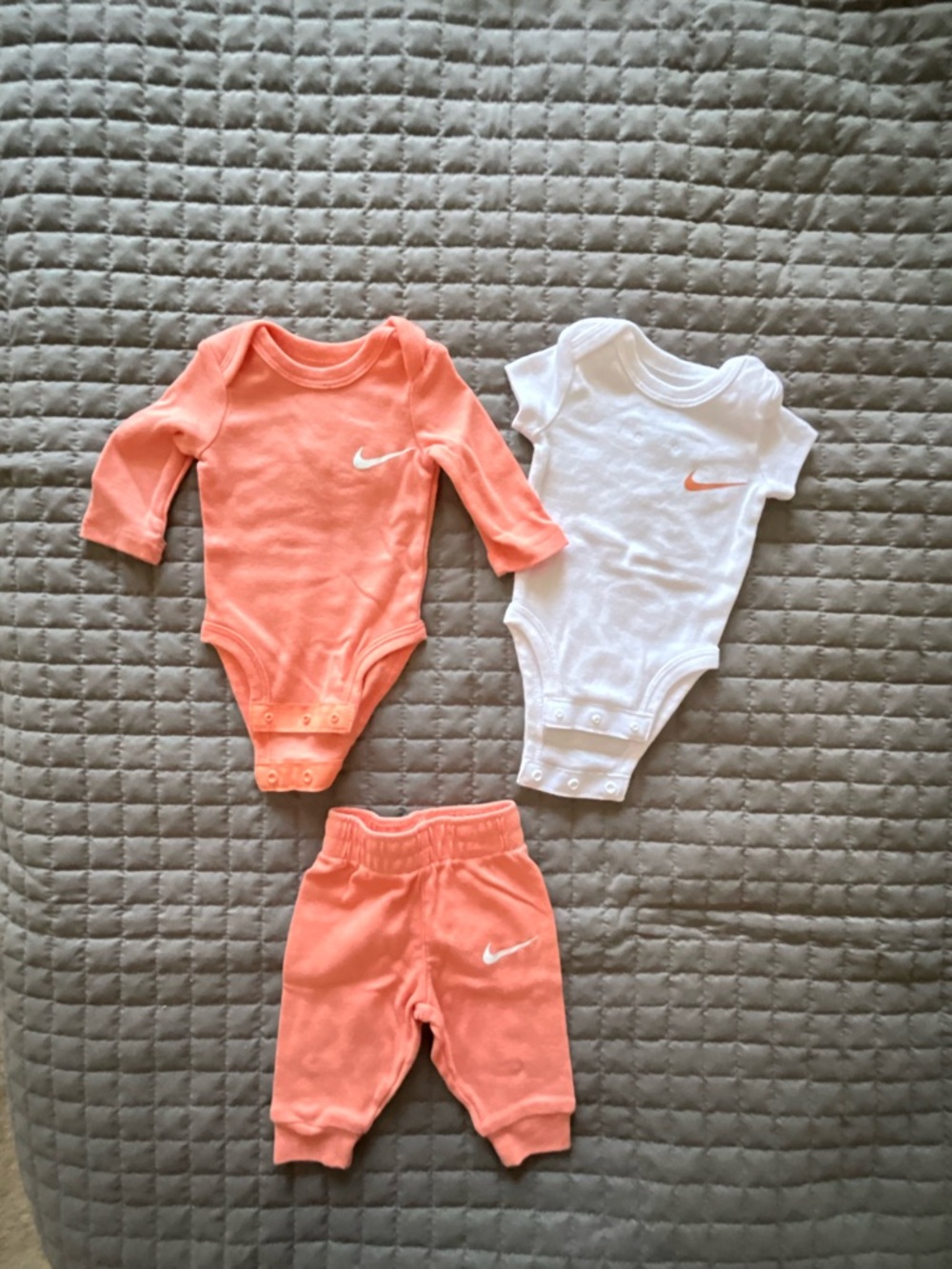 Nike Coral and White Baby Bodysuit Set